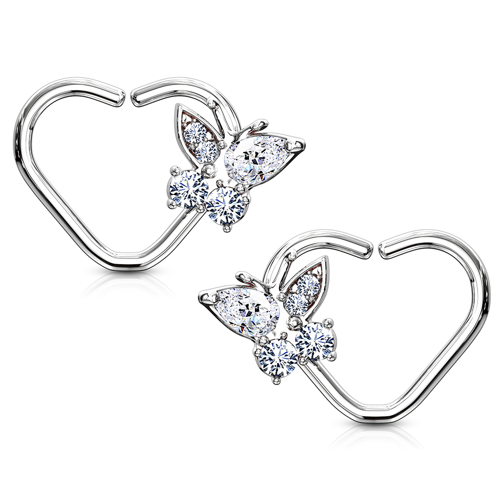 Piercing pour l'oreille en forme de coeur avec un papillon